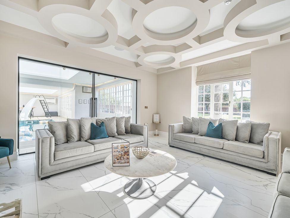 A living room with sofas and a coffee table at Otherton Hall Penkridge