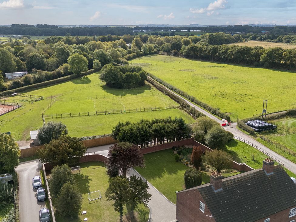A view of a field and trees from above at Otherton Hall in Penkridge
