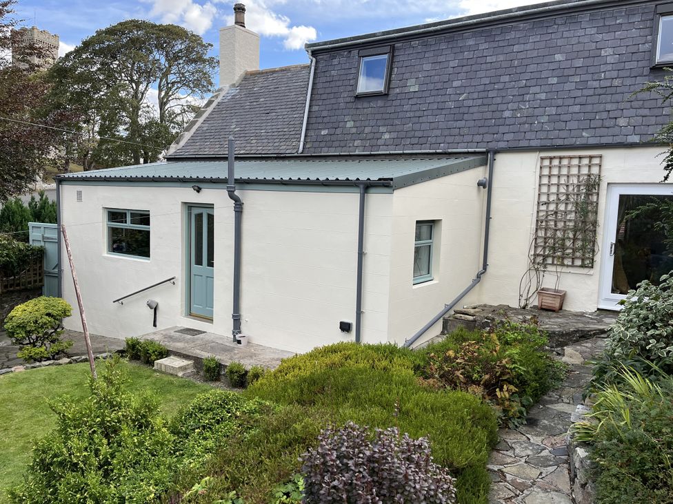 An outdoor view of a house with a garden at 20 South High Street in Portsoy