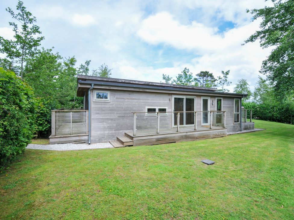 A house with a deck in a garden at 5 Faraway Fields Dobwalls