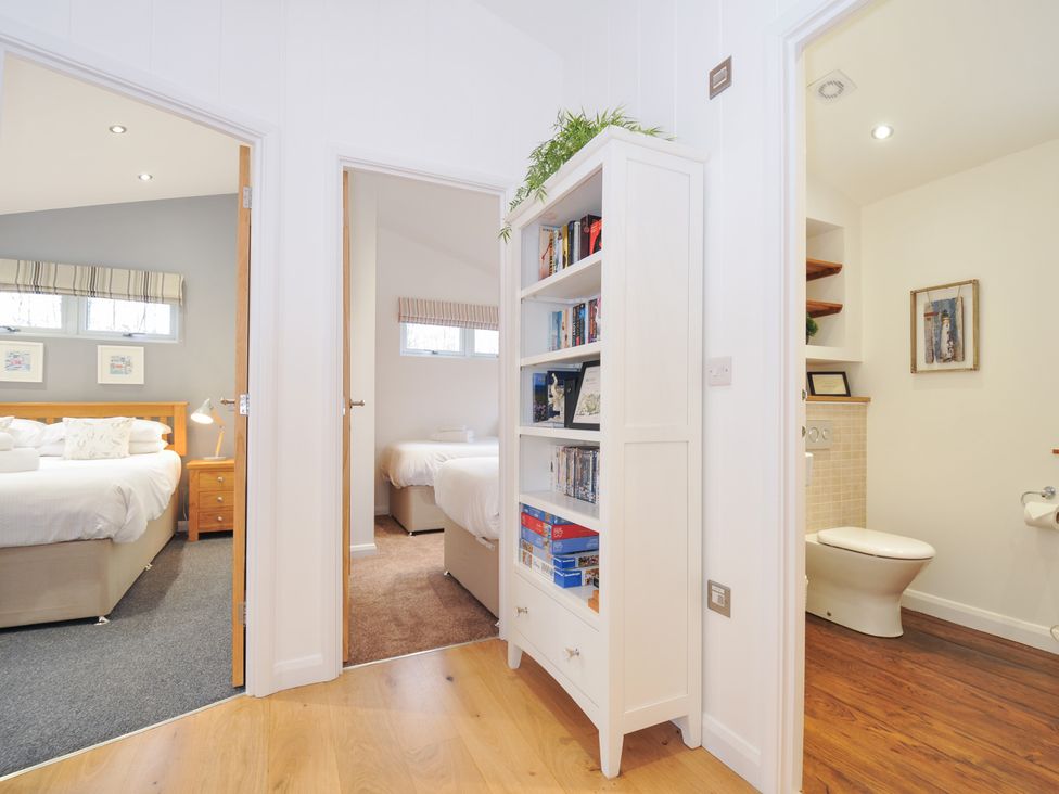 A hallway with bedrooms and a bathroom at 15 Faraway Fields Dobwalls