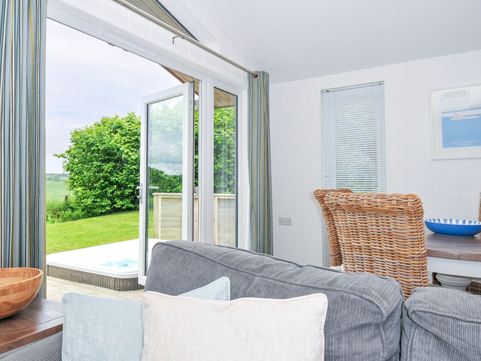 A living room with a view of the garden at 1 Horizon View Dobwalls