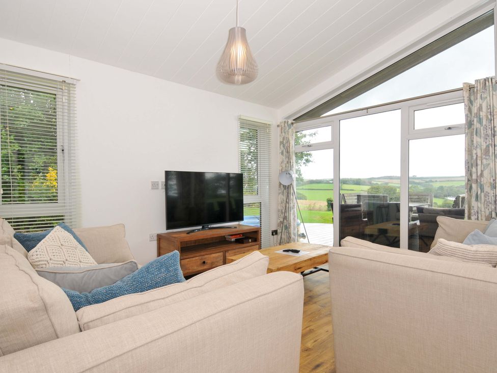 A living room with a sofa and television at 8 Horizon View in Dobwalls