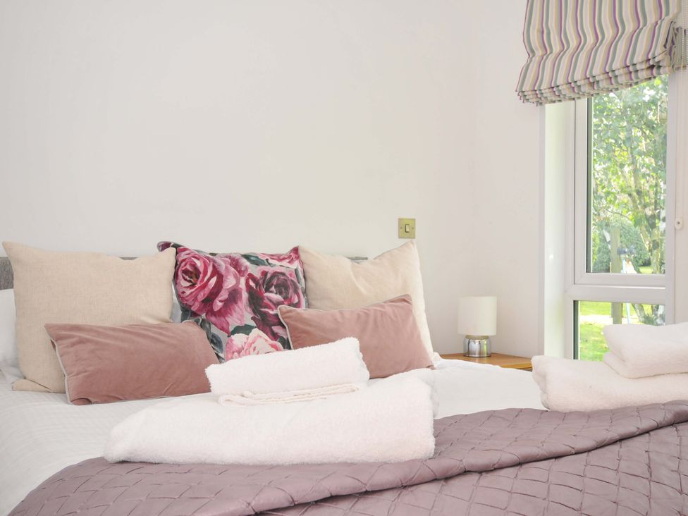 A bedroom with pillows on a bed at 8 Horizon View in Dobwalls