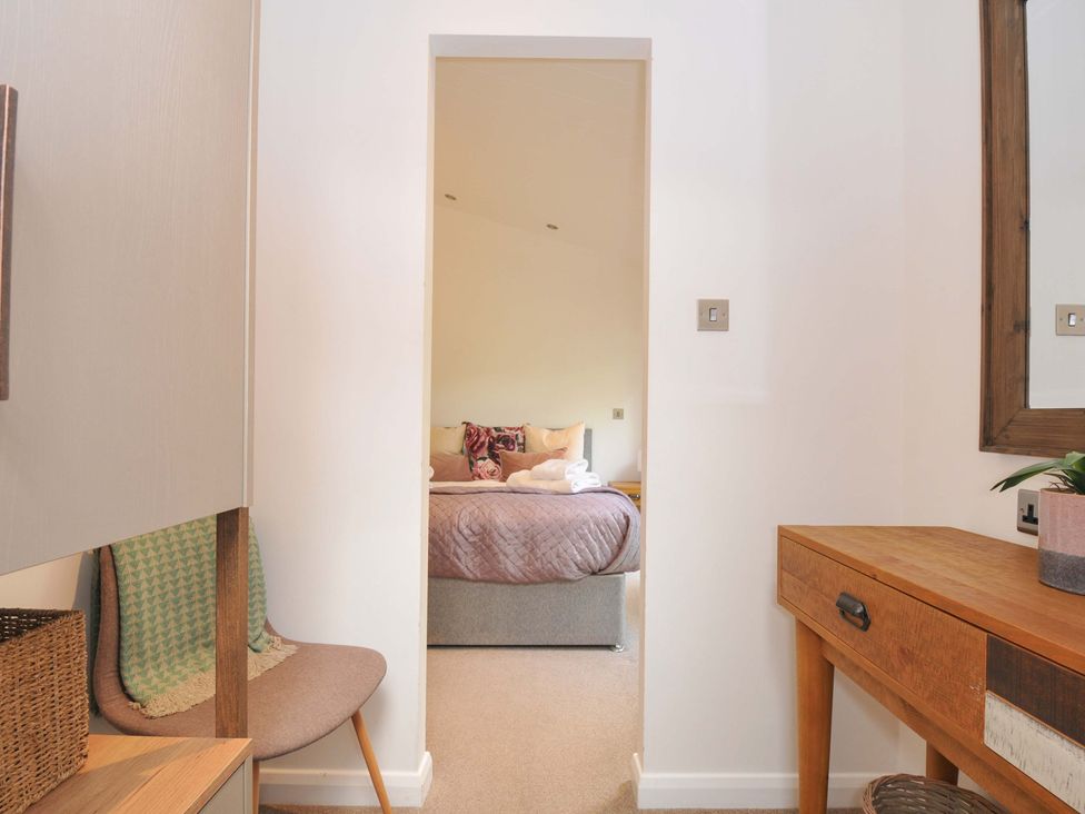 A bedroom view with dresser and bed at 8 Horizon View, Dobwalls
