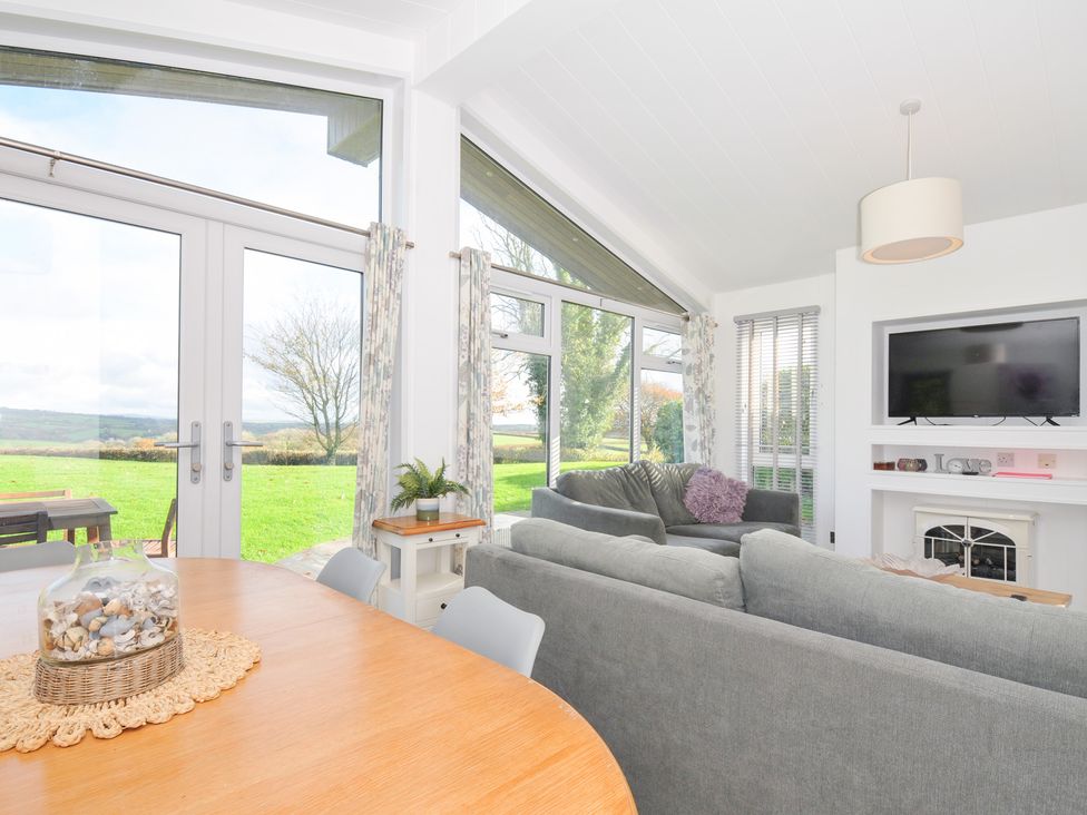 A living room with a sofa and television at 9 Horizon View in Dobwalls