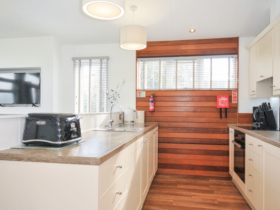 A kitchen with a sink and toaster at 9 Horizon View in Dobwalls