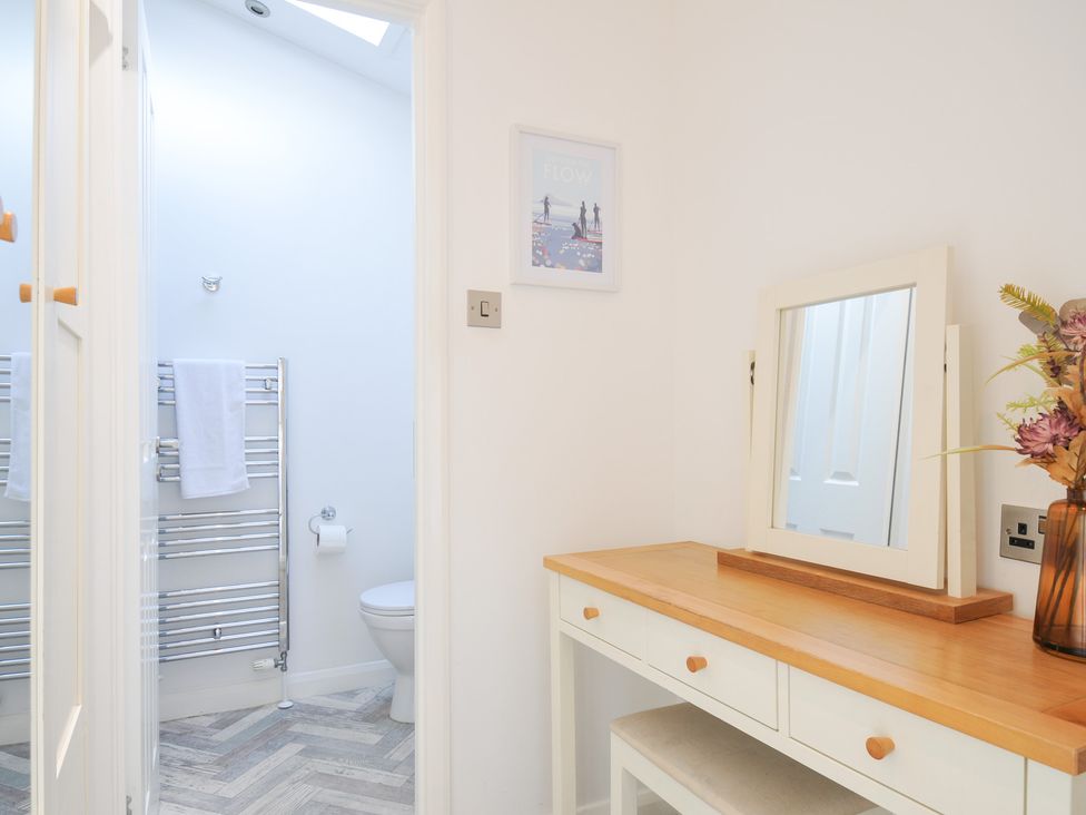 A bathroom with a console table and mirror at 9 Horizon View, Dobwalls