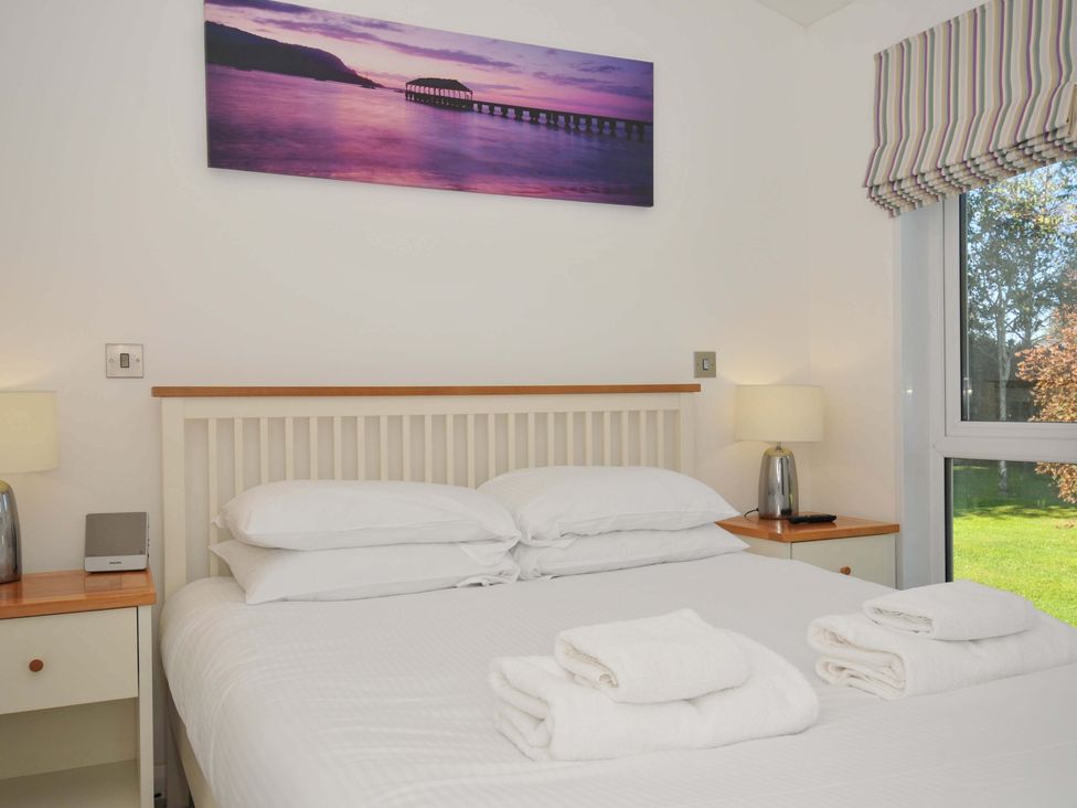 A bedroom with a double bed and nightstands at 10 Horizon View Dobwalls