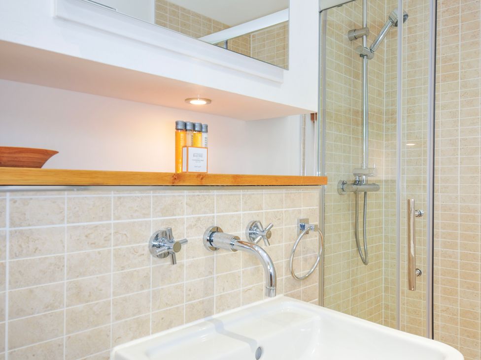 A bathroom with a sink and shower at 15 Horizon View in Dobwalls