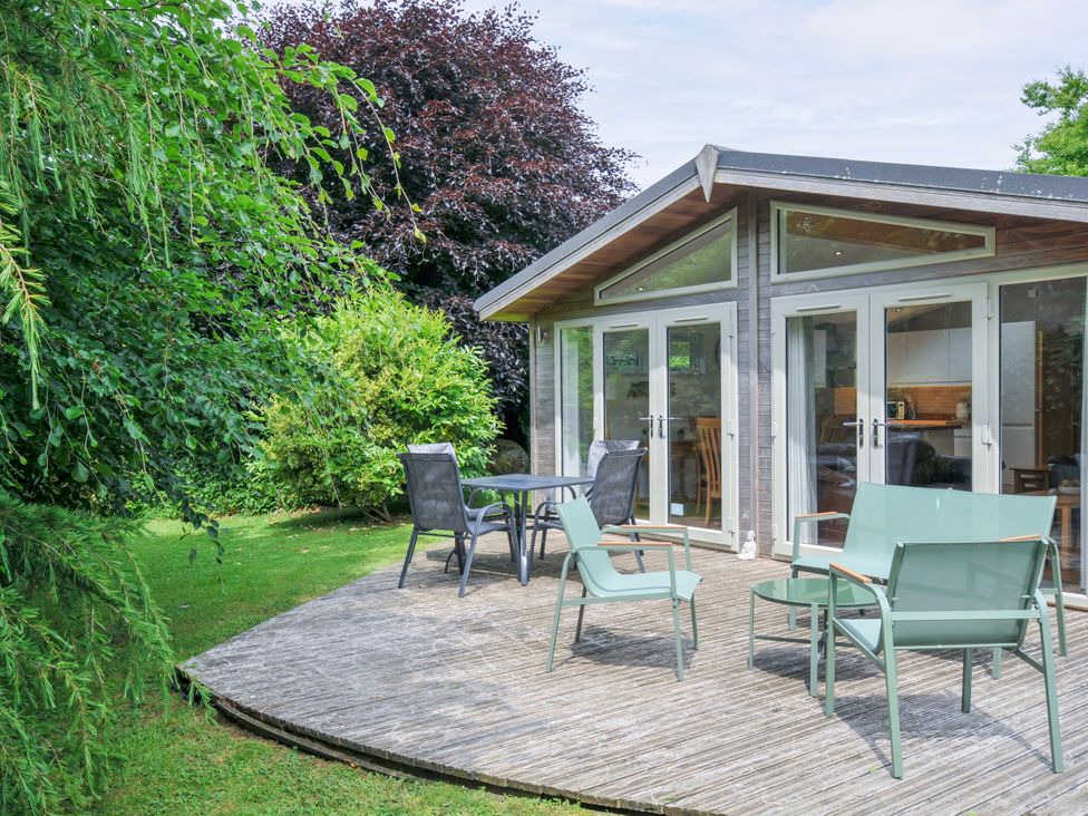An outdoor seating area with chairs and a table at 15 Horizon View in Dobwalls