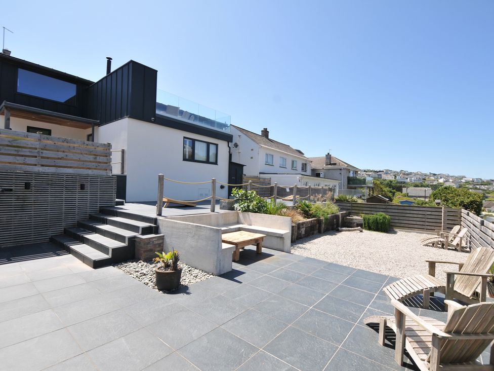 A garden with stairs and a planter at Breakers View in Polzeath
