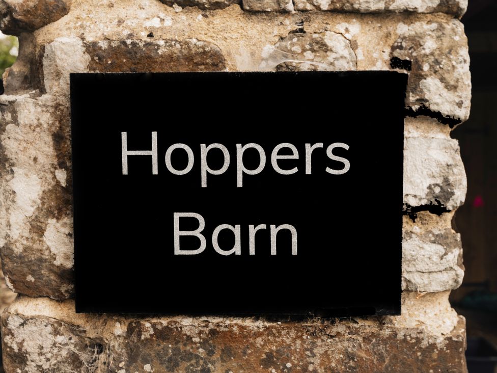 A sign displaying Hoppers Barn at Hoppers Barn near Pancrasweek near Holsworthy