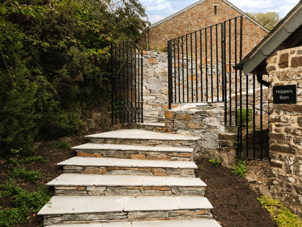 Steps leading to a gate at Hoppers Barn Pancrasweek near Holsworthy