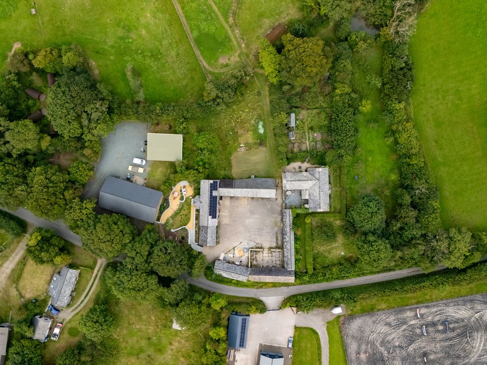 An aerial view showing buildings and garden areas at Hoppers Barn Pancrasweek near Holsworthy