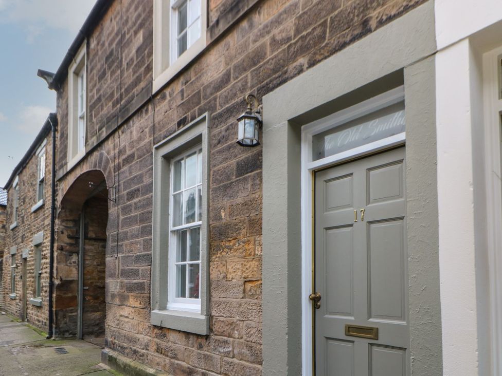 An exterior view of a building with door and window at The Old Smithy in Barnard Castle