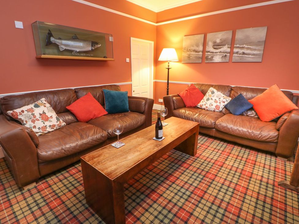 A living room with a sofa and coffee table at The Smithy in Barnard Castle