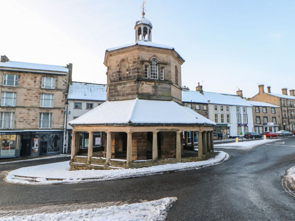 A circular structure with columns on a snowy street at The Smithy in Barnard Castle