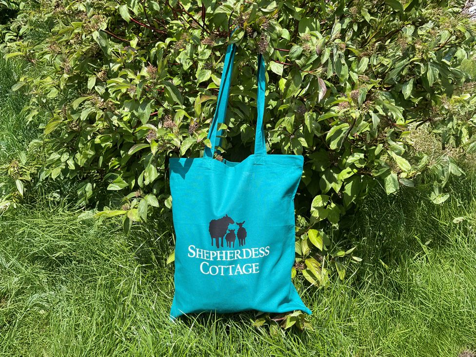 A tote bag featuring Shepherdess Cottage in Moffat