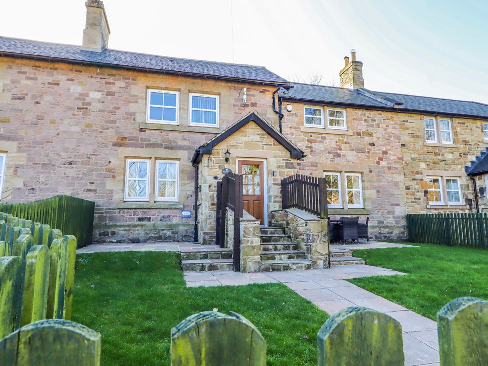 A house with a front door and windows in Lucker at Bramley