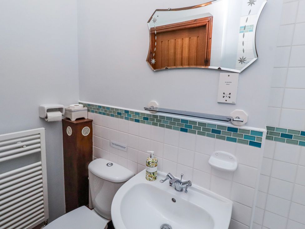 A bathroom with a sink and toilet at No9 Budle Sands in Bamburgh