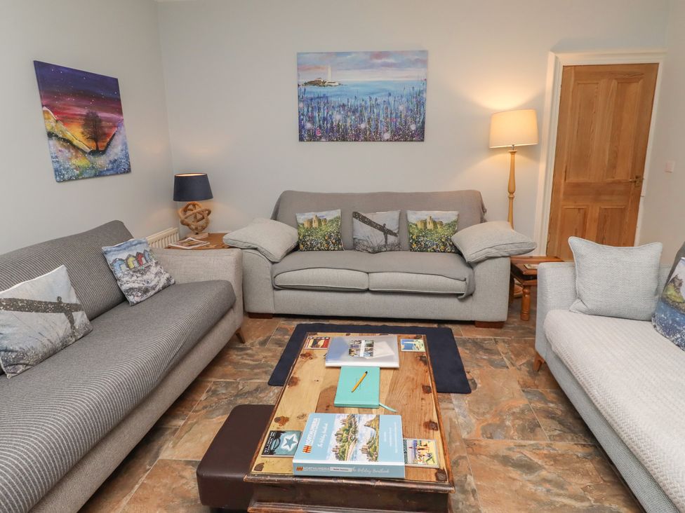 A living room with sofas and a coffee table at Number Seventeen Amble