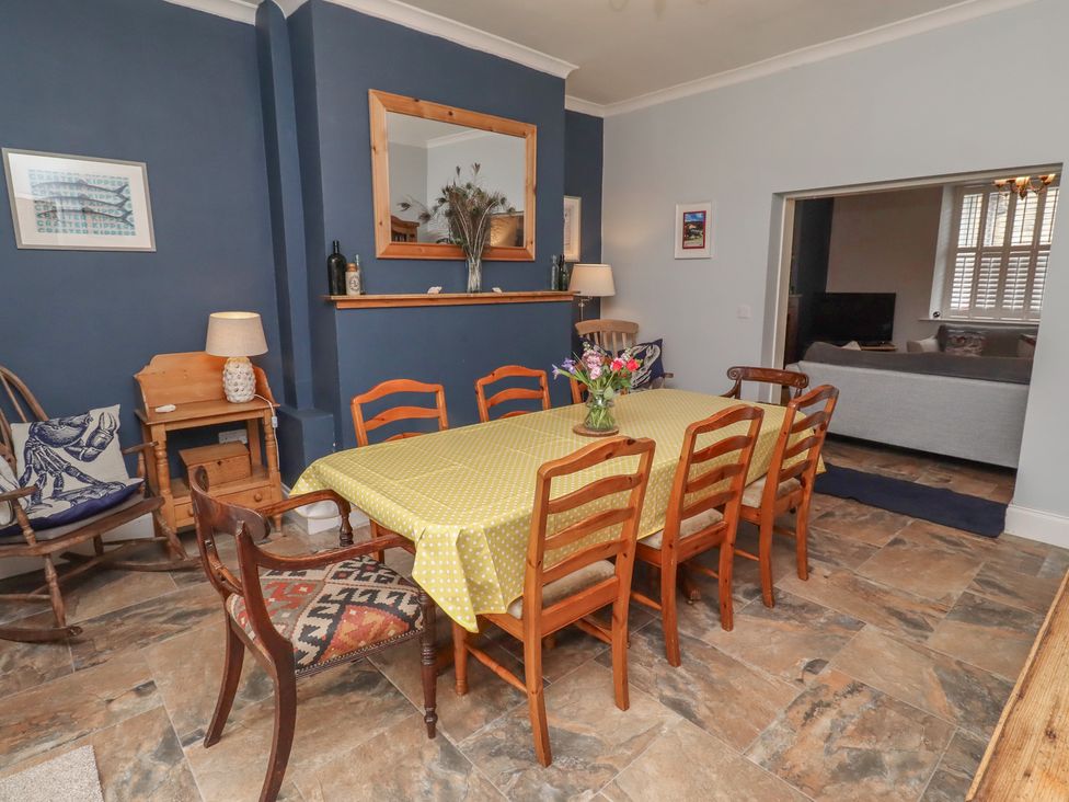 A dining room with a table and chairs at Number Seventeen Amble