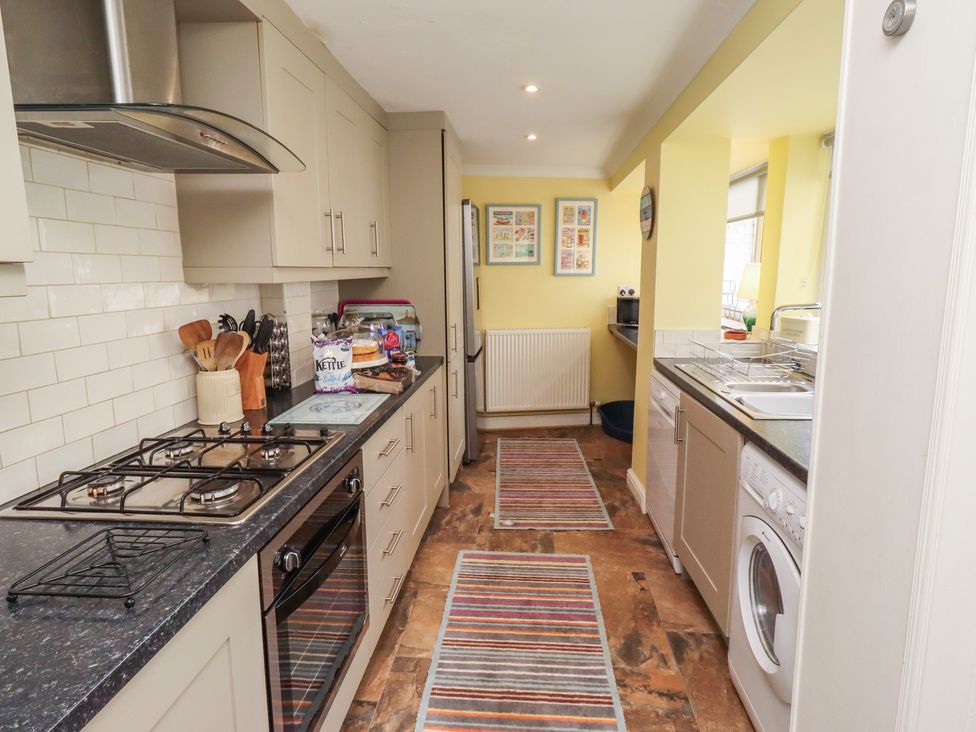 A kitchen with appliances and utensils at Number Seventeen in Amble