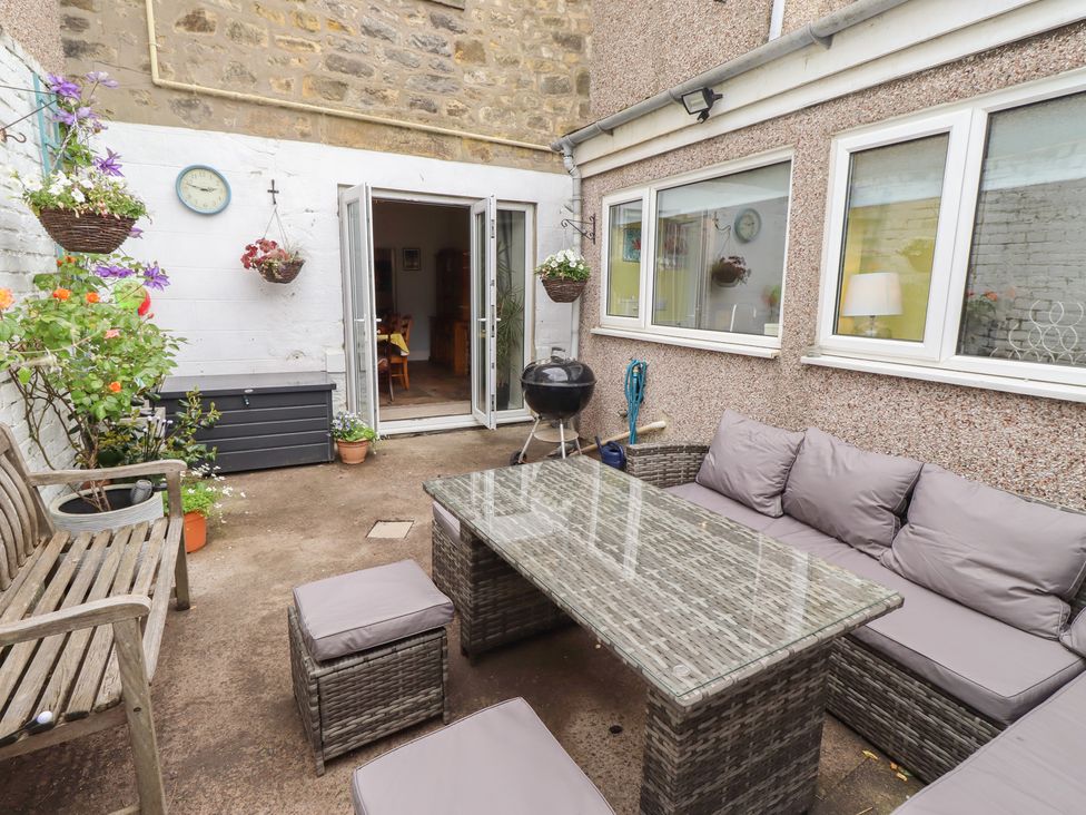 An outdoor area with seating and plants at Number Seventeen Amble
