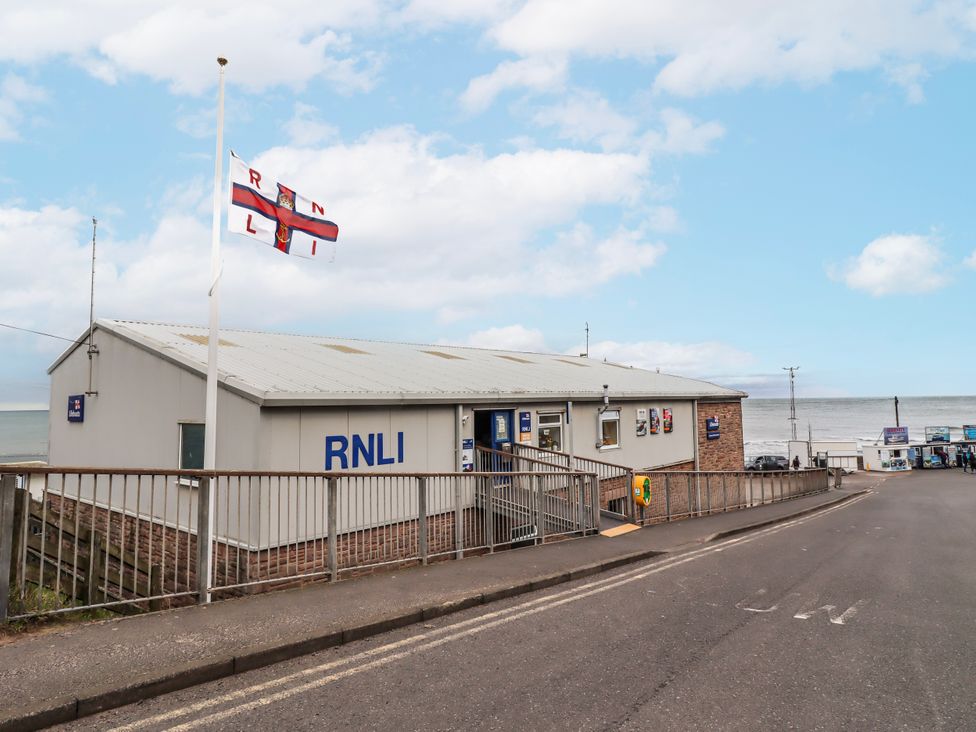 An RNLI building near the ocean at Cuddy's Holm Seahouses