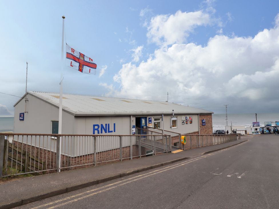 A building with RNLI signage near the beach at Old Bakery No2 Seahouses
