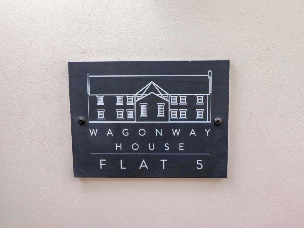 A sign for Wagonway House Flat 5