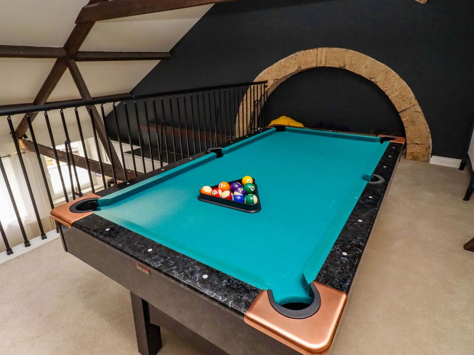 A pool table with balls arranged at Treetops, Alnwick