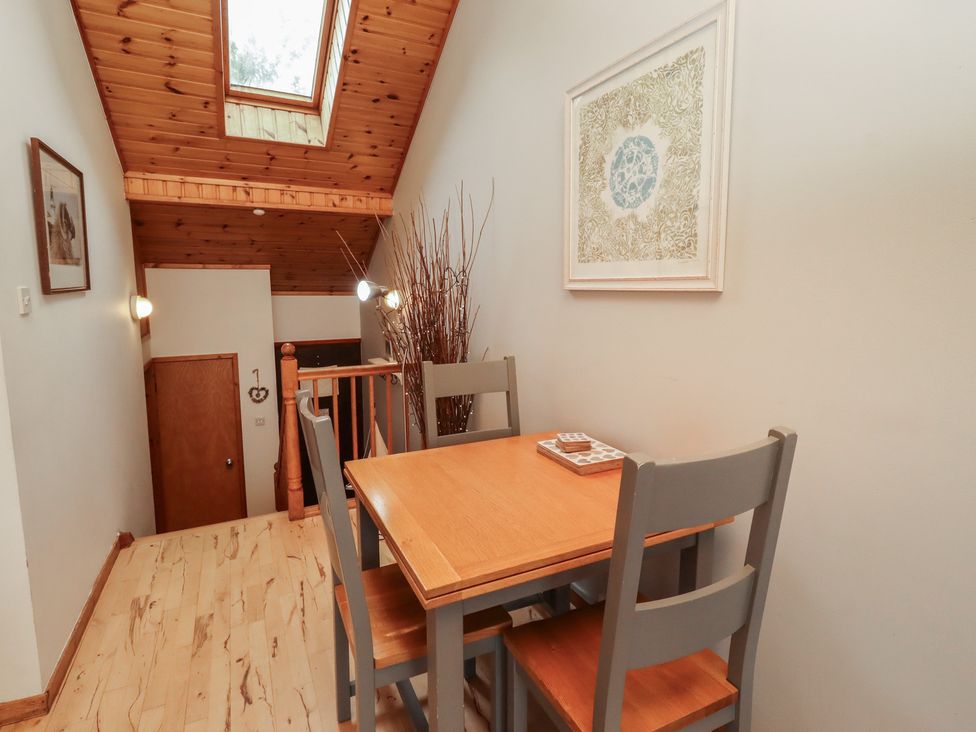 A dining area with a table and chairs at Links View in Embleton