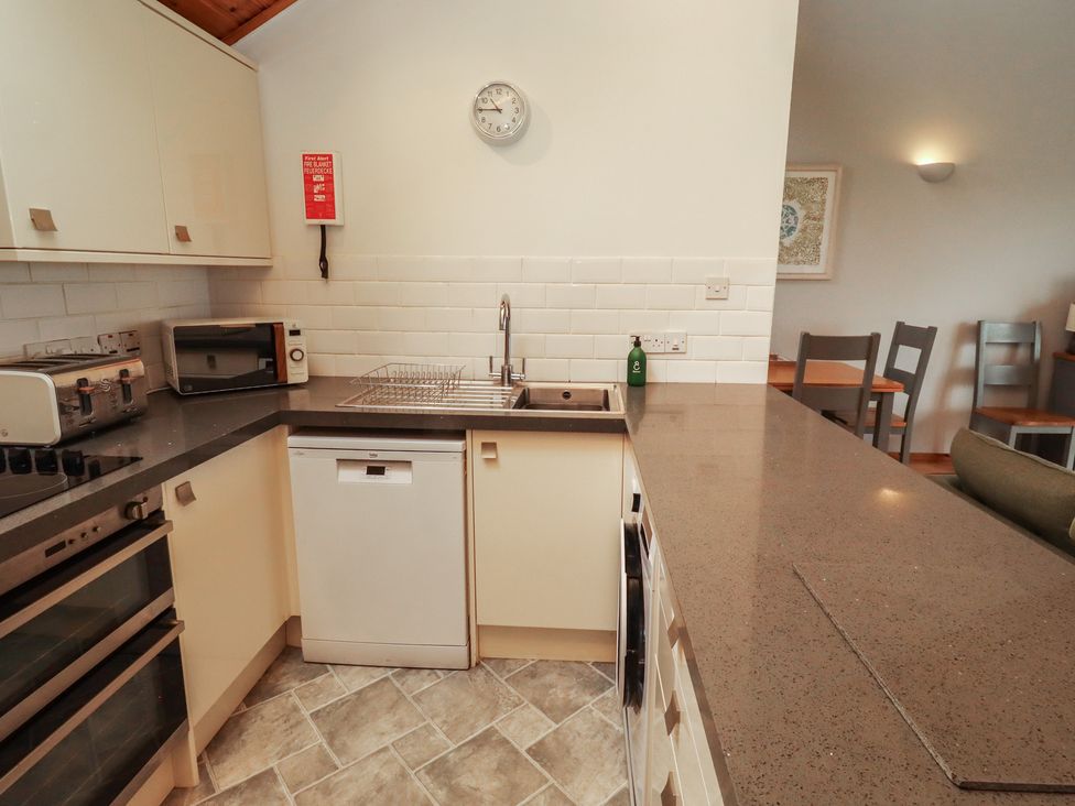 A kitchen with appliances and countertop at Links View in Embleton