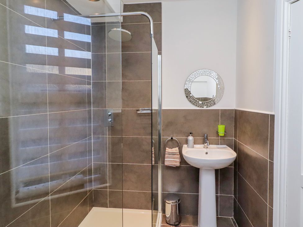 A bathroom with a shower and sink at Alnbank in Alnmouth