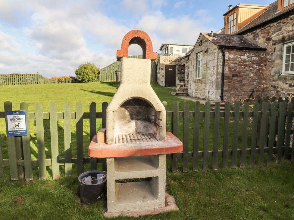 A barbecue grill in an outdoor area at Heather Cottages - Plover in Bamburgh