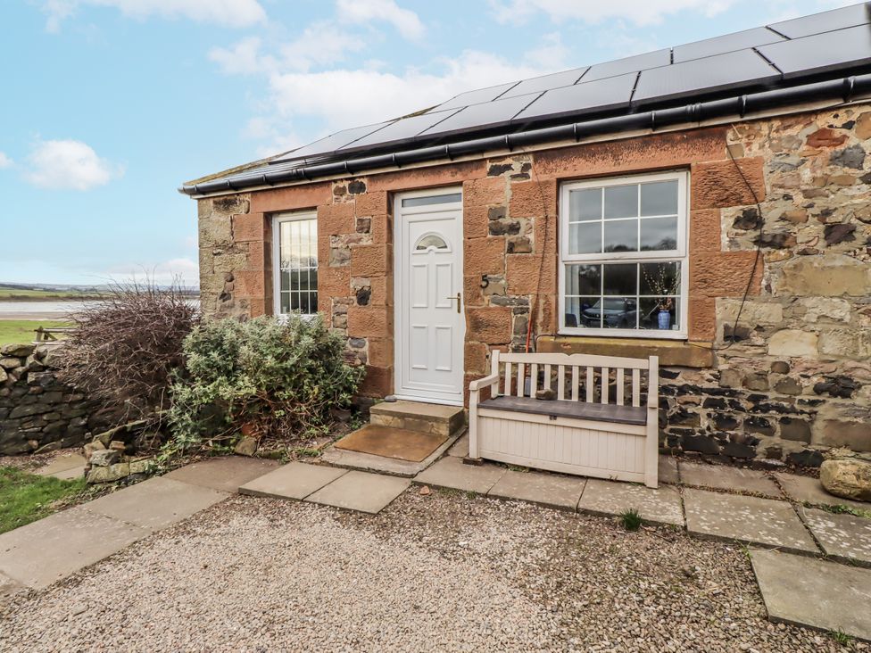 An exterior view of a cottage entrance at Kittiwake Cottage, Budle Bay, Bamburgh