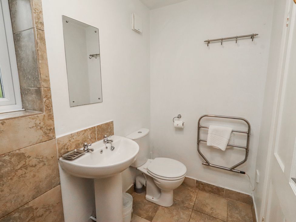 A bathroom with a sink and toilet at St Marys Cottages No4 Low Newton-by-the-Sea