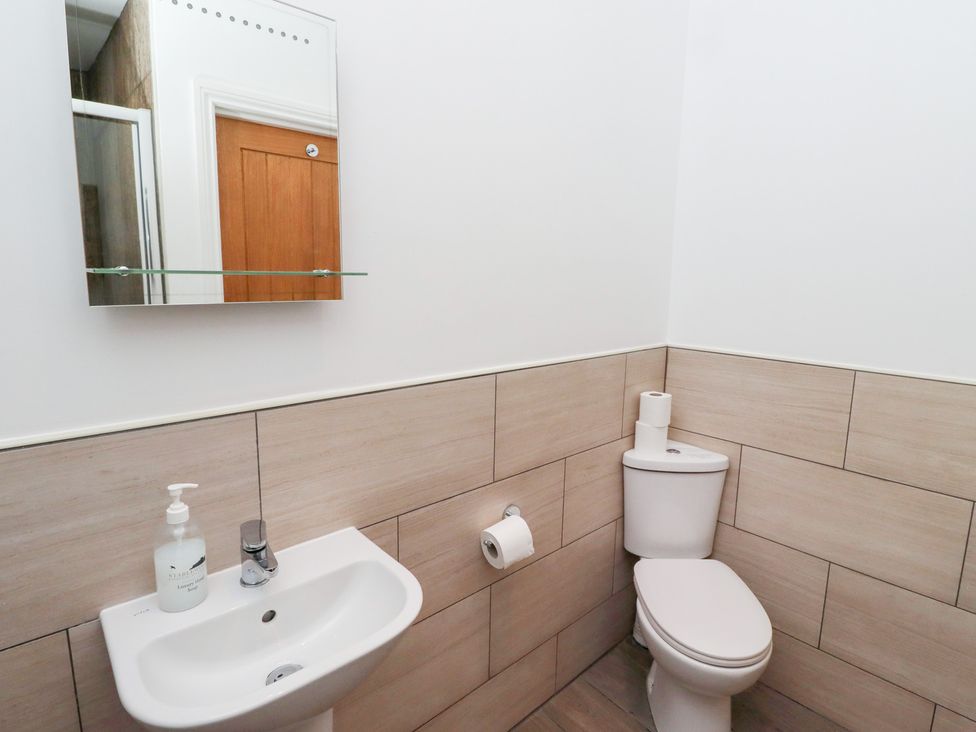 A bathroom with a sink and toilet at Chiff Chaff in Lucker