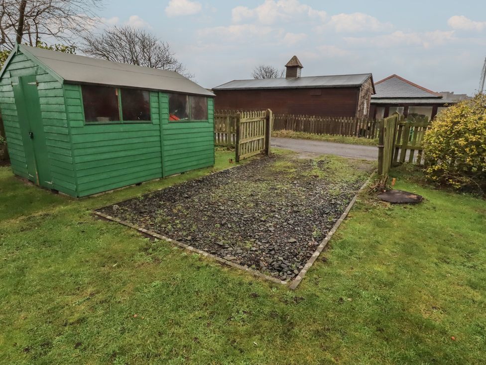 A shed and gravel area at Armstrong Cottages No6 Bamburgh
