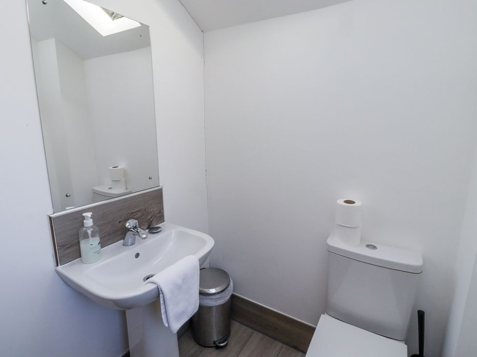 A bathroom with a sink and toilet at Old Mill (Lucker) Lucker