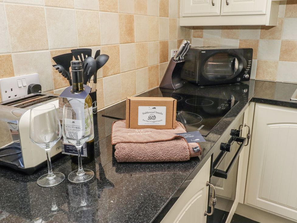 A kitchen with various appliances and utensils at Millstone in Lucker