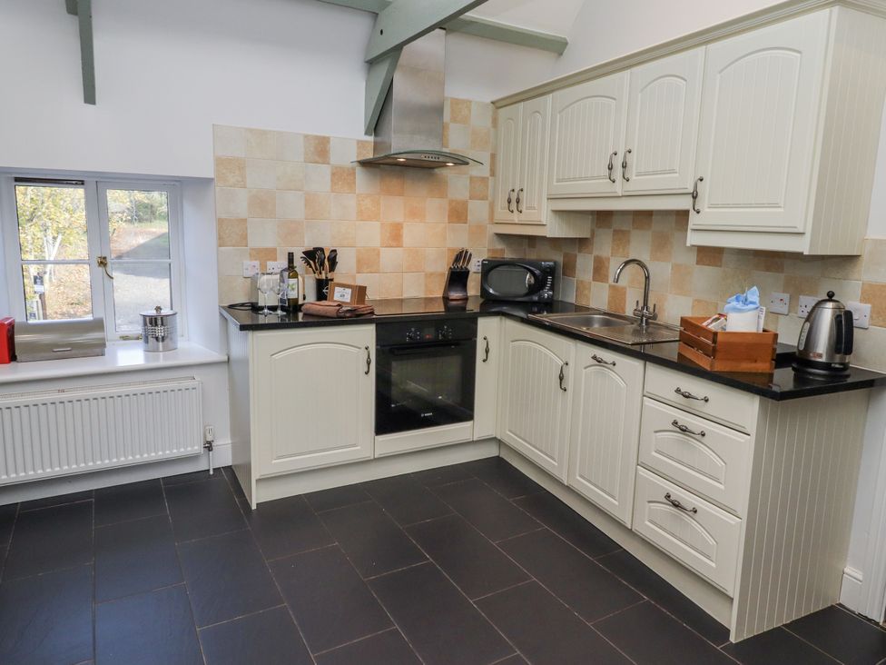 A kitchen with countertop and appliances at Millstone in Lucker