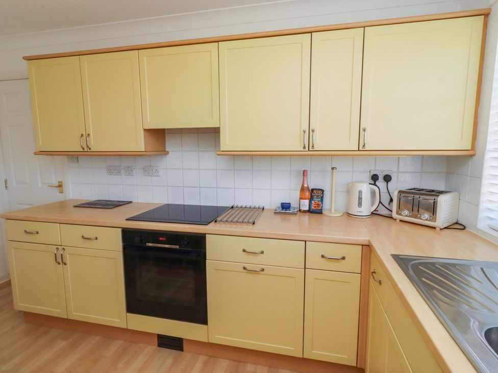A kitchen with cabinets and appliances at 6 Westview Embleton