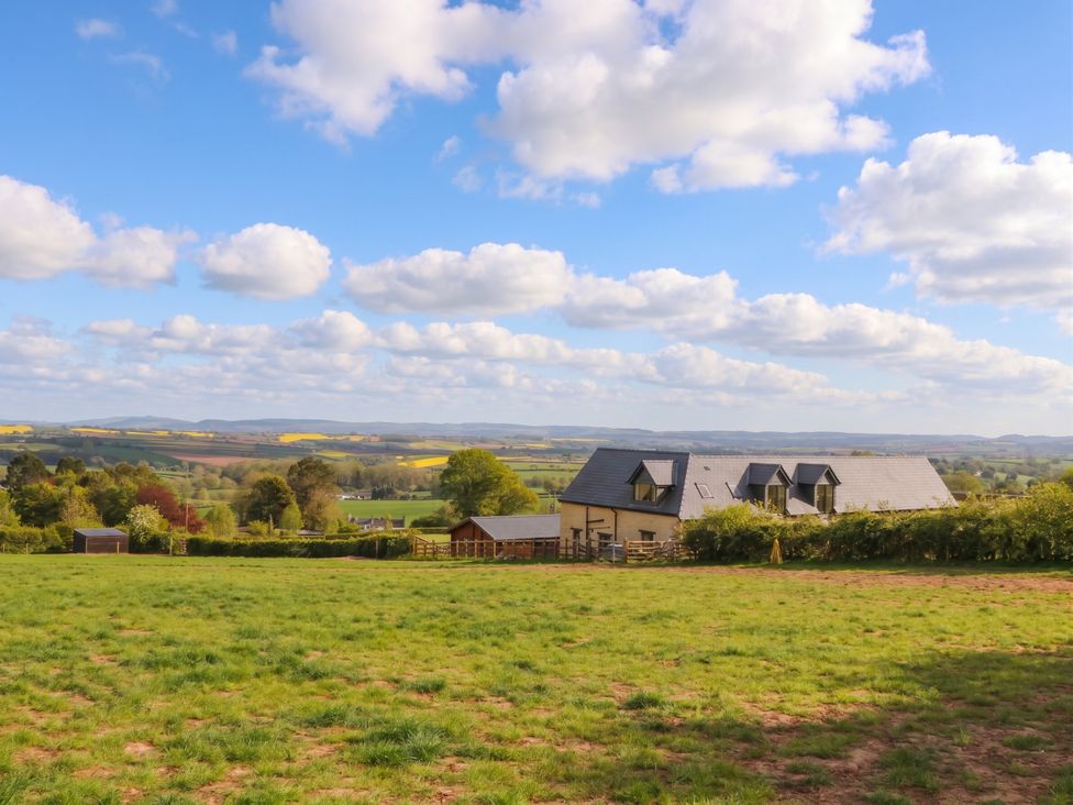 A house in a field with a view at Palace Farmhouse in St Weonards