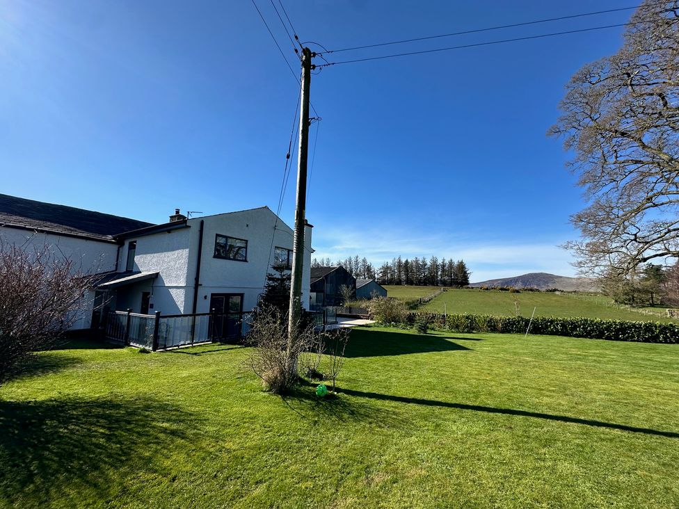 A house and garden area at How Hill Farm Cottage in Greystoke