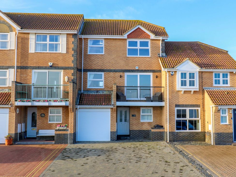 A house with a balcony and garage at 79 Selsey Avenue