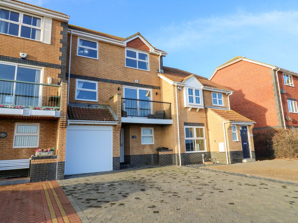 A house with a balcony and garage at 79 Selsey Avenue