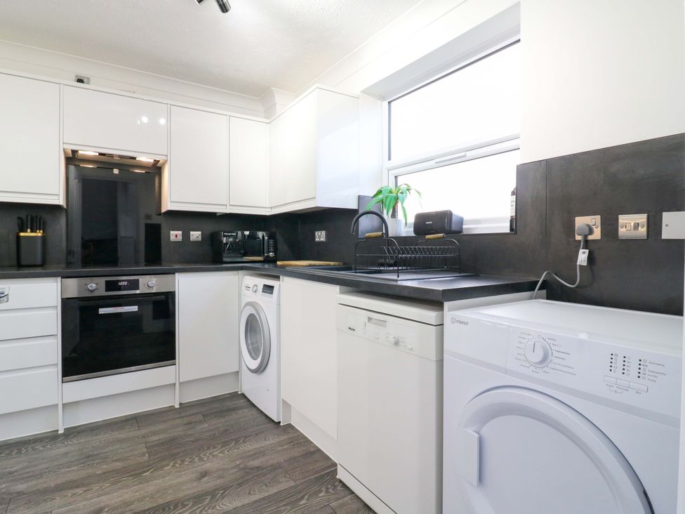 A kitchen with appliances including an oven and dishwasher at 79 Selsey Avenue 